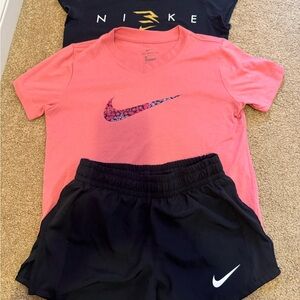 Nike girls shorts and 2 tees